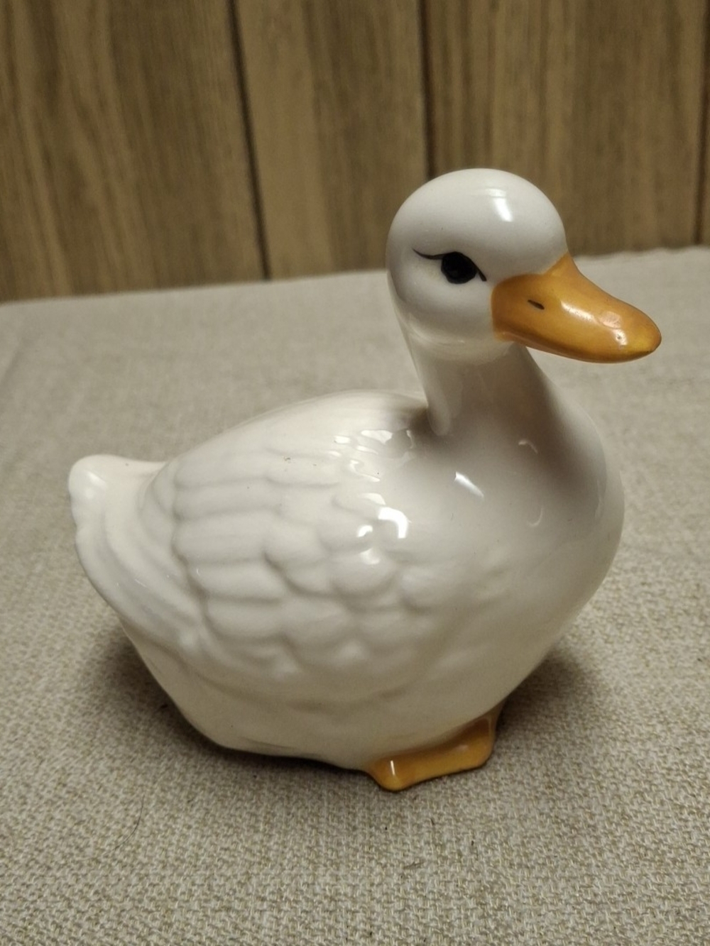 White Ceramic Duck Figurine with Yellow Beak